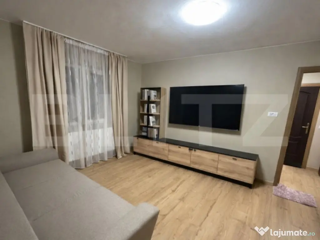Apartament renovat de vânzare – Micro 15, parter, 40 mp 