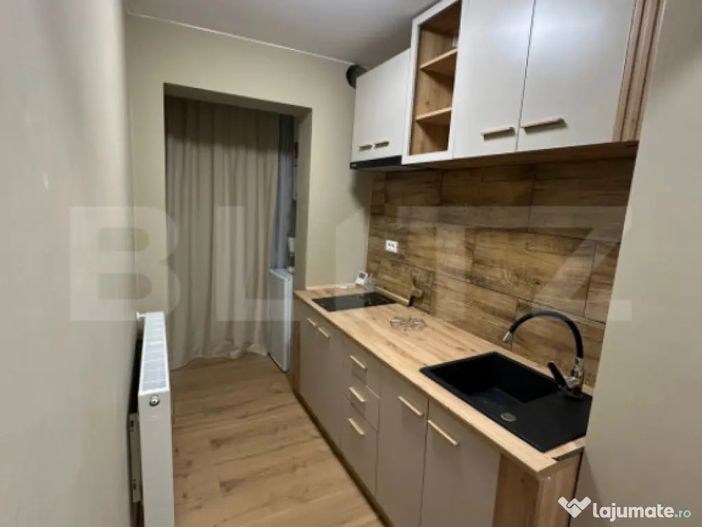 Apartament renovat de vânzare – Micro 15, parter, 40 mp 