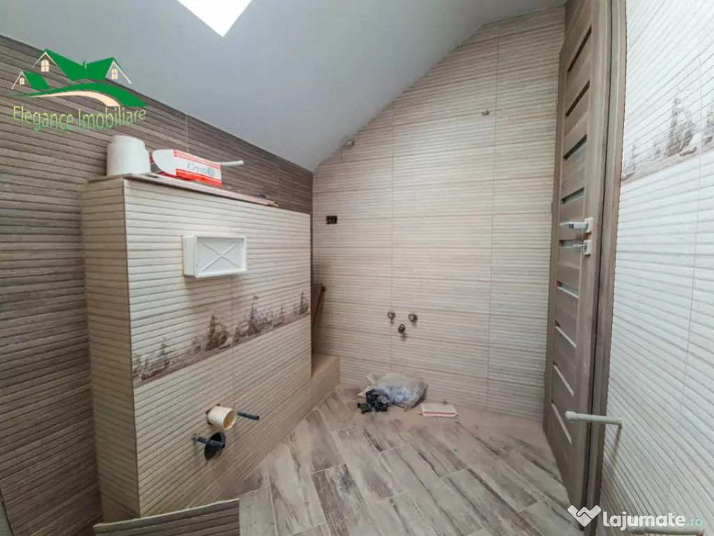 Duplex modern cu locuință secundară și curte amenajată,