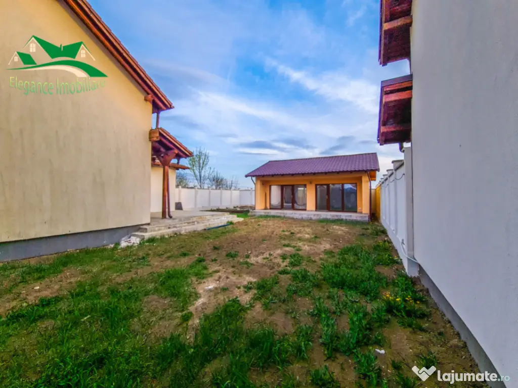Duplex modern cu locuință secundară și curte amenajată,