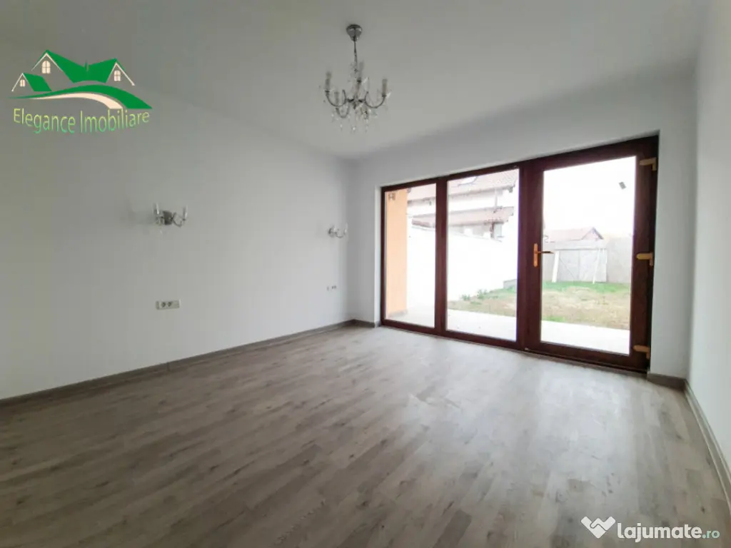 Duplex modern cu locuință secundară și curte amenajată,