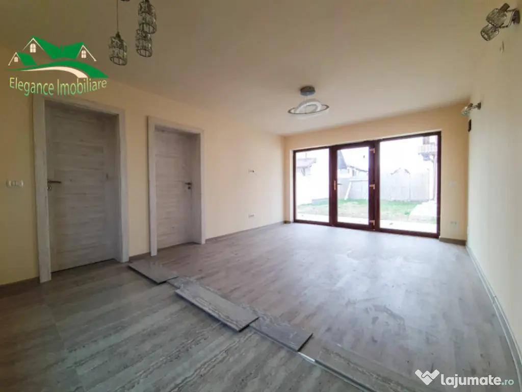 Duplex modern cu locuință secundară și curte amenajată,