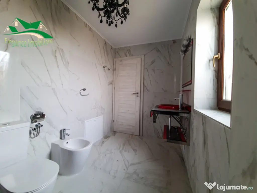 Duplex modern cu locuință secundară și curte amenajată,