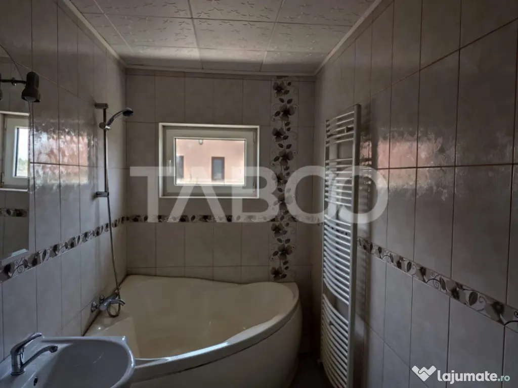 Casa tip insiruita de vanzare 147 mp cu garaj si curte in Su 