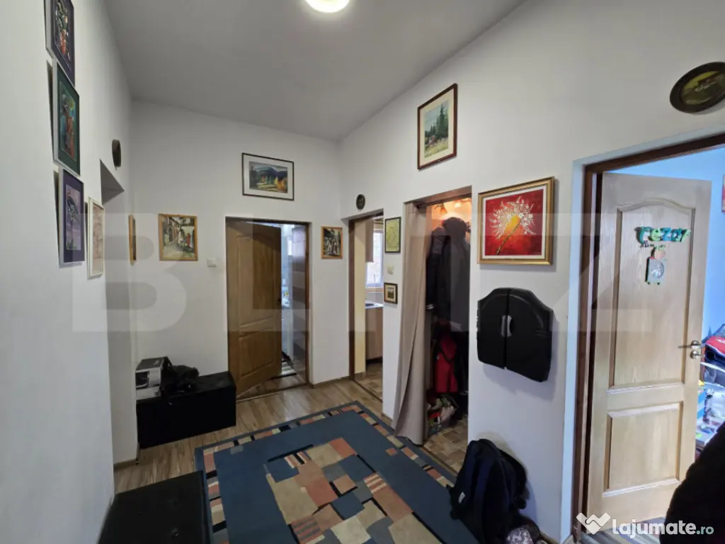 Apartament in casa 100 mp, 3 camere, teren 260mp, zona Dambu