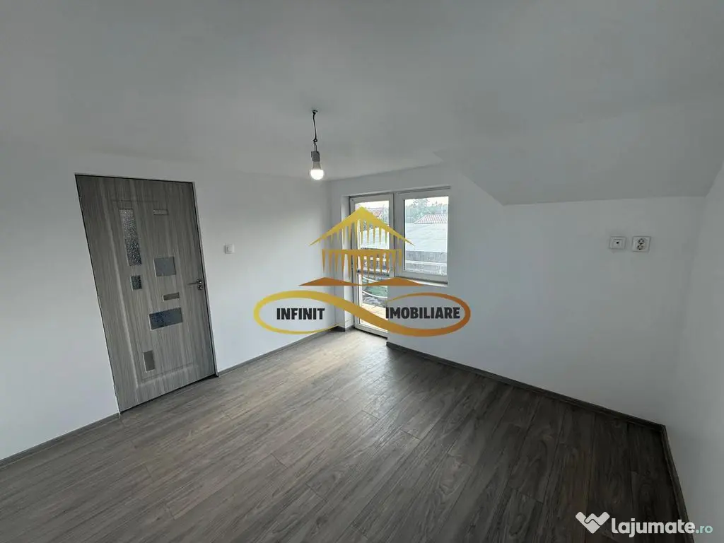 Casa de vanzare in Bacau Saucesti spatioasă cu etaj separat 