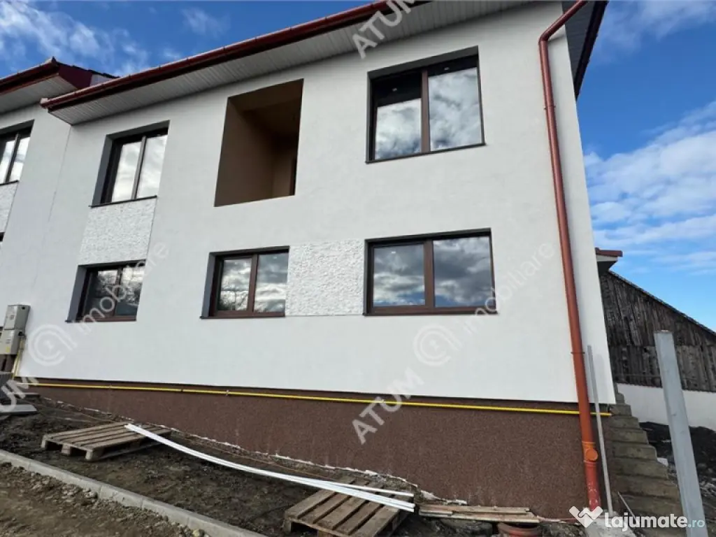 Casa individuala 4 camere 2 bai 120 mp utili 300 mp teren in 