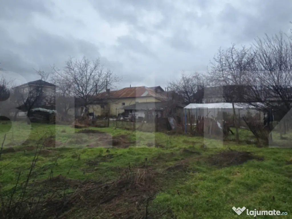 Teren intravilan 1.869 mp, front 80 metri, zona Cârcea - St