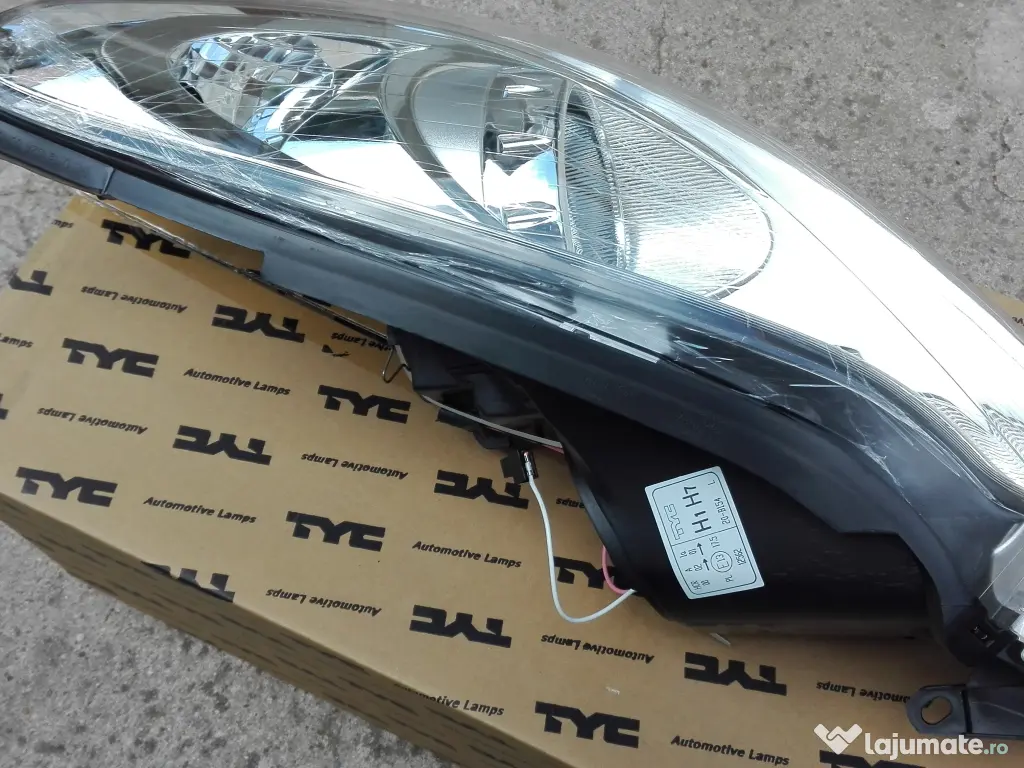 Far Opel Corsa D stanga NOU 