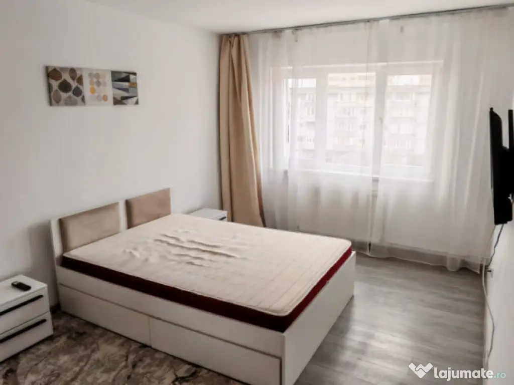 Apartament cu 2 camere, suprafata de 50 mp, mobilat si utila 