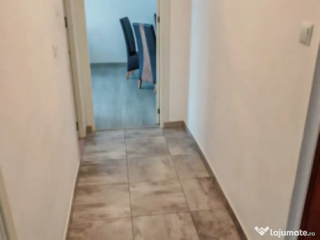 Apartament cu 2 camere, suprafata de 50 mp, mobilat si utila 