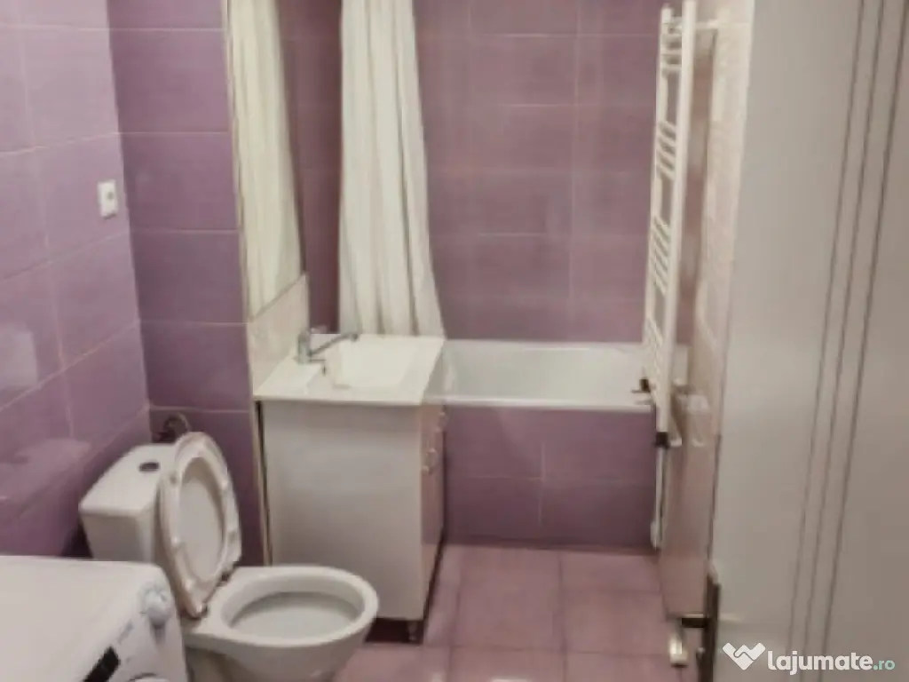 Apartament cu 2 camere, suprafata de 50 mp, mobilat si utila 