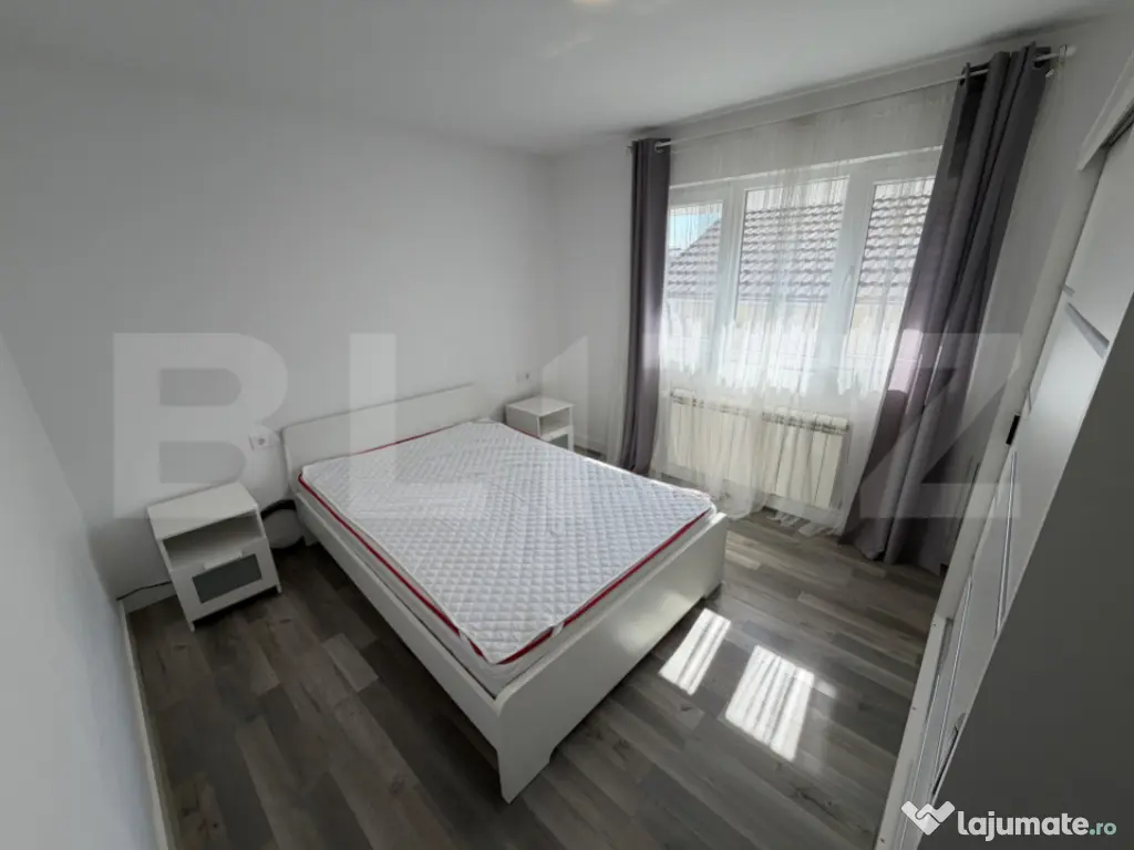 Casă modernă 5 camere, curte comuna, zonă liniștită – 