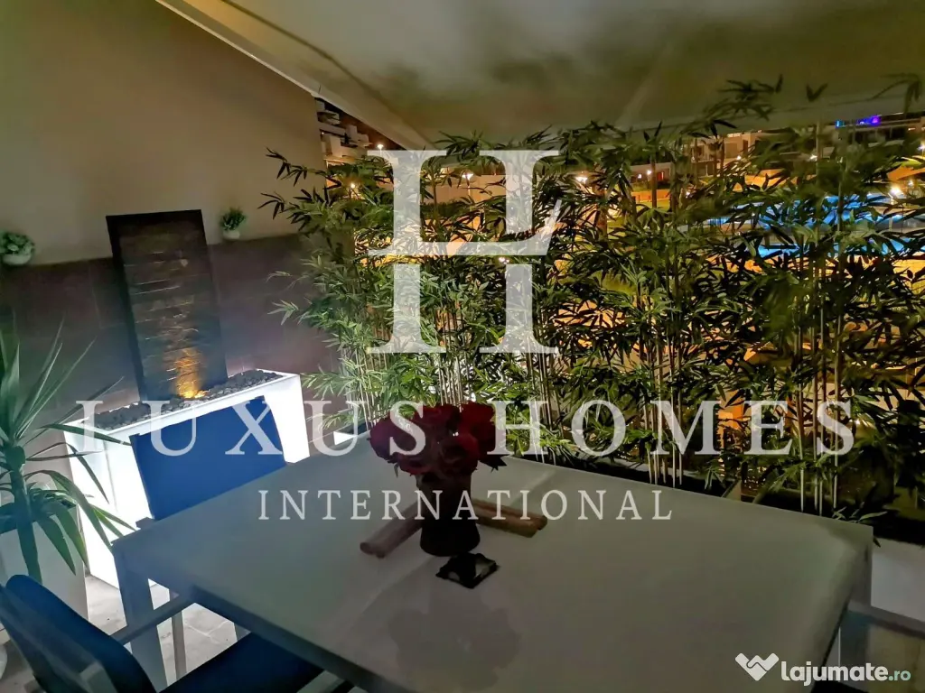 Penthouse cu terasă pe acoperiș și vedere la mare într-o stațiune de lux 