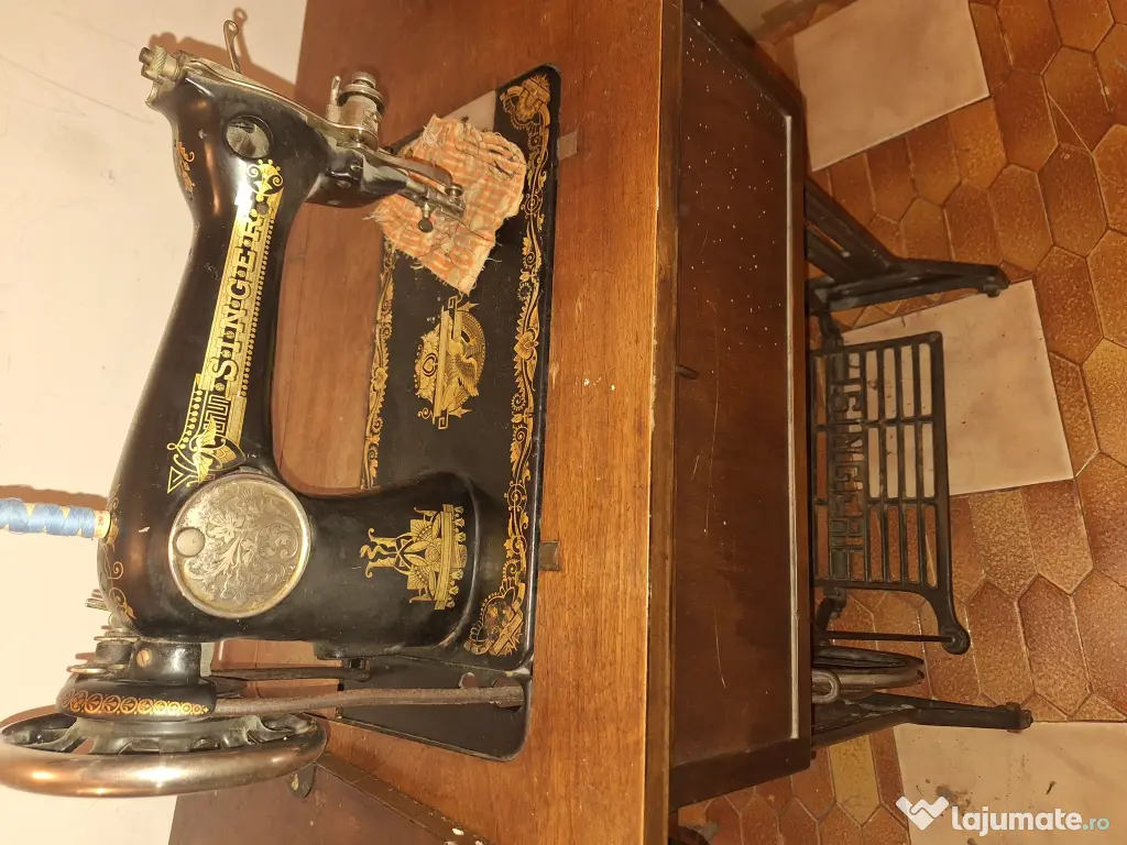 Masina de cusut Singer 