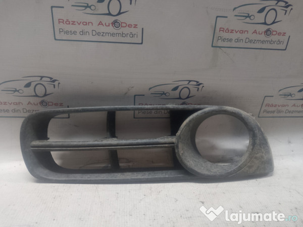 Grila proiector stanga Skoda Roomster 2011