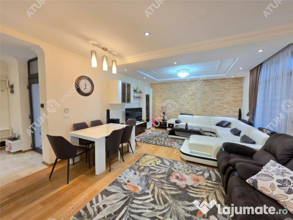 Casa 4 camere 3 bai terasa si teren 250 mp zona Octavian Gog 