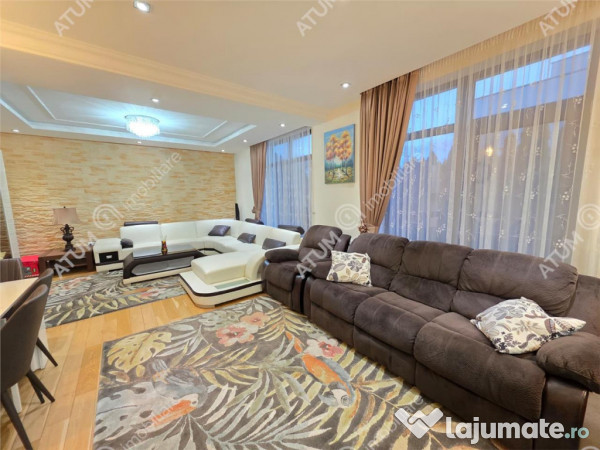 Casa 4 camere 3 bai terasa si teren 250 mp zona Octavian Gog 