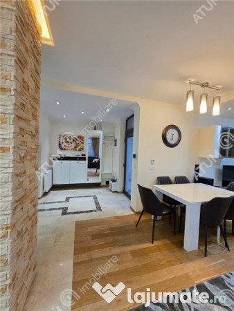 Casa 4 camere 3 bai terasa si teren 250 mp zona Octavian Gog 