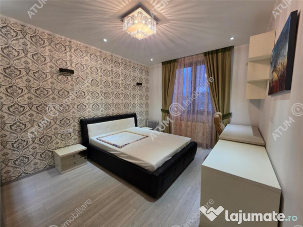 Casa 4 camere 3 bai terasa si teren 250 mp zona Octavian Gog 