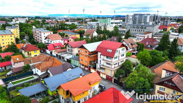 Rezidential Investitional: apartament 2 camere si garaj pro
