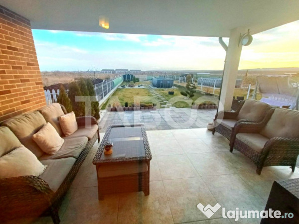 Casa moderna 5 camere piscina si curte de 464 mp de vanzare 