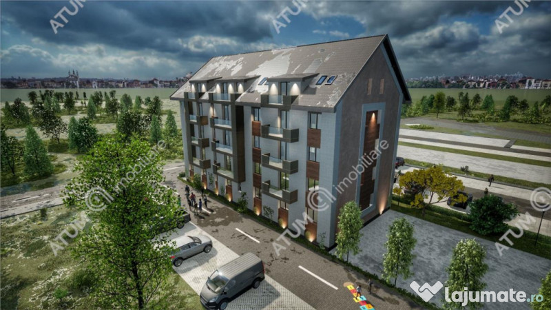 Garsoniera intabulata decomandata si loc parcare in Talmaciu 