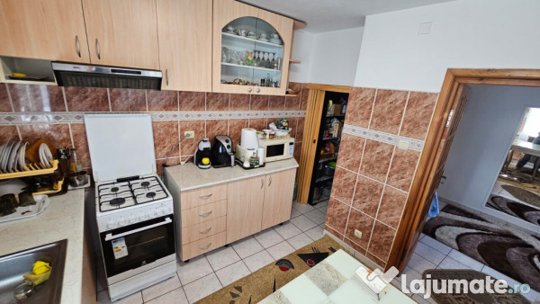 BAICOI - casa P+E, ter-1354mp, pret. locuinta/activ. comerci 