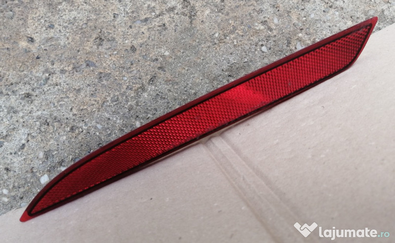 Catadioptriu Opel Astra J stanga 