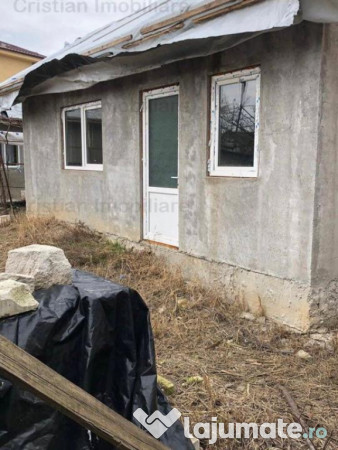 Radu Negru Casa la P M LA ROSU teren 275mp 11m la strada