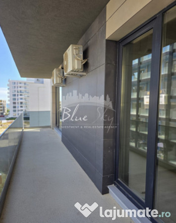 Apartament modern cu balcon generos și acces la piscină 