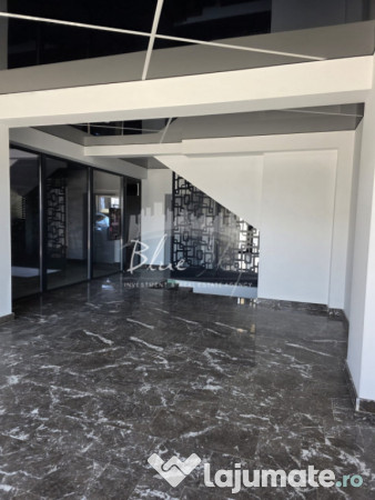 Apartament modern cu balcon generos și acces la piscină 