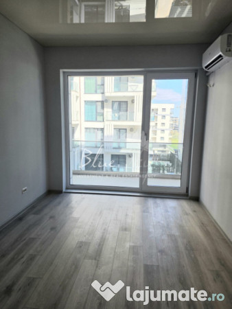 Apartament modern cu balcon generos și acces la piscină 