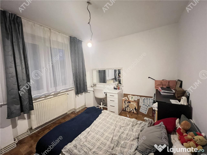 Apartament cu 4 camere 2 bai si balcon etaj 1 zona Rahovei d