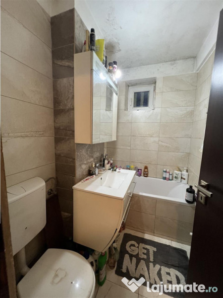 Apartament cu 4 camere 2 bai si balcon etaj 1 zona Rahovei d