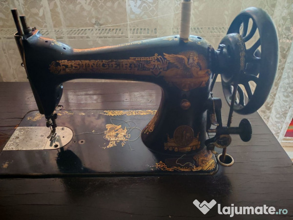 Masina de cusut Singer