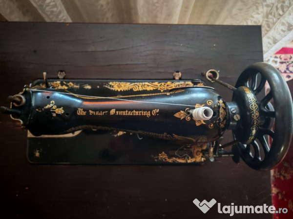 Masina de cusut Singer