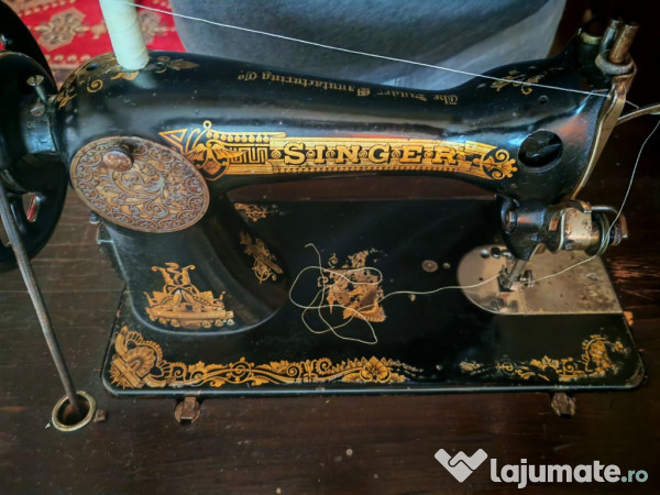 Masina de cusut Singer