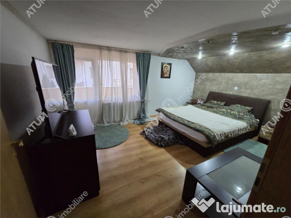 Casa individuala 8 camere 2 garaje 500 mp teren zona Selimba