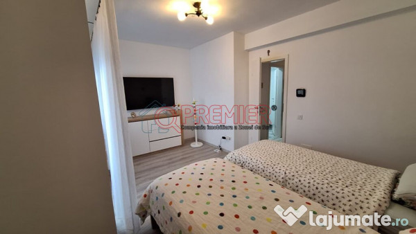 Casă înșiruită P+1+M - 4 camere - 2 terase - curte 