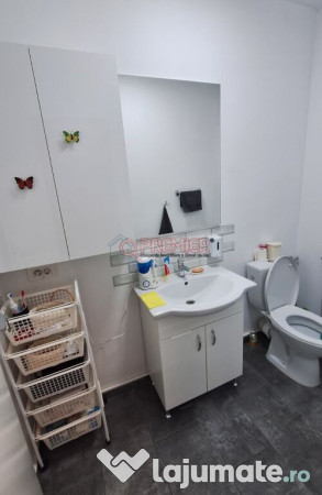 Casă înșiruită P+1+M - 4 camere - 2 terase - curte 