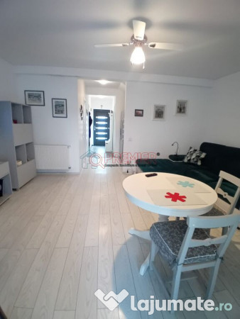 Casă înșiruită P+1+M - 4 camere - 2 terase - curte 