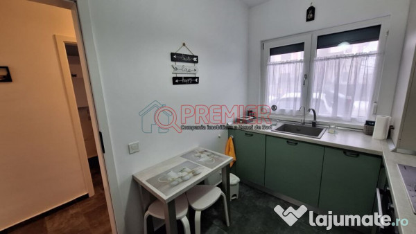 Casă înșiruită P+1+M - 4 camere - 2 terase - curte 