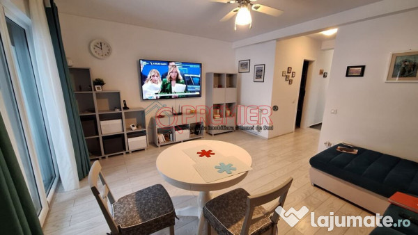 Casă înșiruită P+1+M - 4 camere - 2 terase - curte 