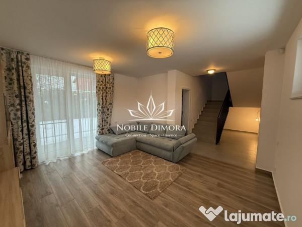 Casa moderna cu 4 camere, 2 bai, terasa si gradina de 50m...