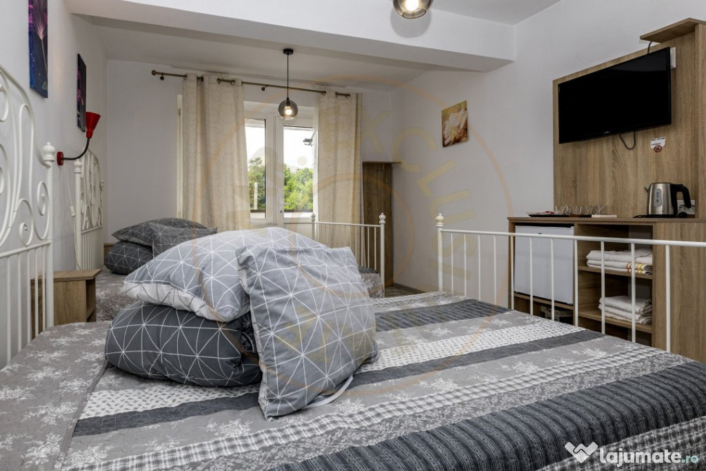 Motel, camping, piscina si lacuri de pescuit pe un teren de 