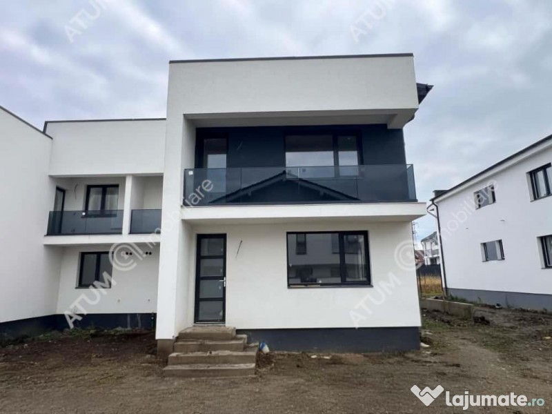 Casa cu 4 camere 2 bai curte de 50 mp zona Calea Cisnadiei S 