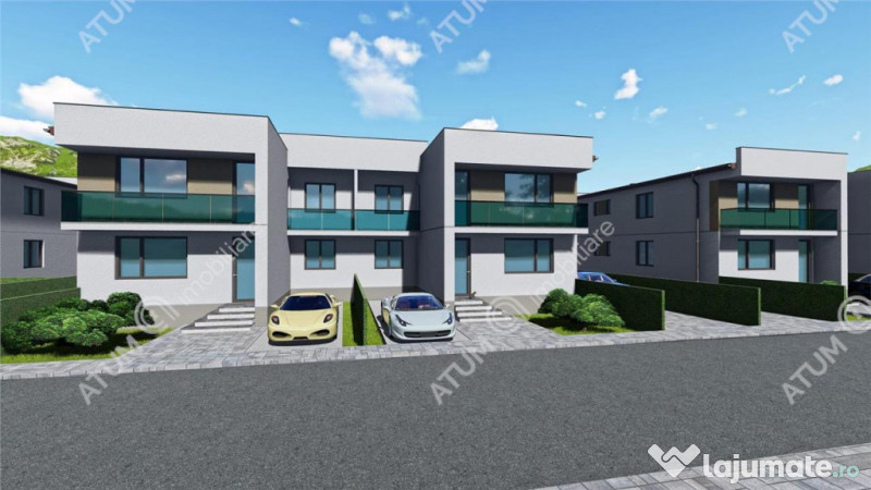 Casa cu 4 camere 2 bai curte de 50 mp zona Calea Cisnadiei S 