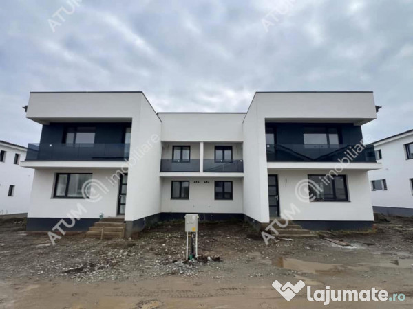 Casa cu 4 camere 2 bai curte de 50 mp zona Calea Cisnadiei S 