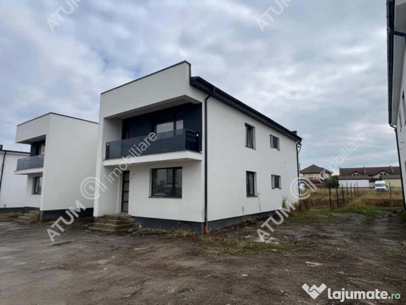 Casa cu 4 camere 2 bai curte de 50 mp zona Calea Cisnadiei S 